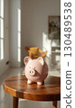 Pig piggy bank in the room 130489538