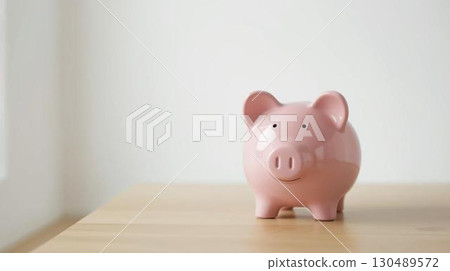 Pig piggy bank in the room 130489572