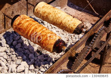 Rolled bakery meat rolls in charcoal 130489645