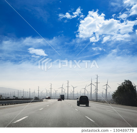 California road with electric windmills aerogenerators 130489779