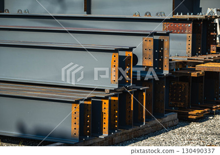 Material storage area: Stacked steel beams 130490337