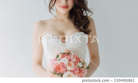 Beautiful bride and shining bouquet 130490861