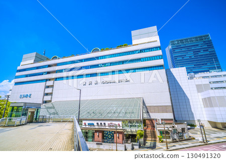 Yokohama cityscape in Japan, including the east exit of Yokohama Station (center) and JR Yokohama Tower (September 6th) 130491320