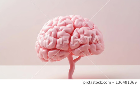 Pink artificial brain growing like a small tree on a white surface with a pink background representing mental health, creativity and growth mindset 130491369