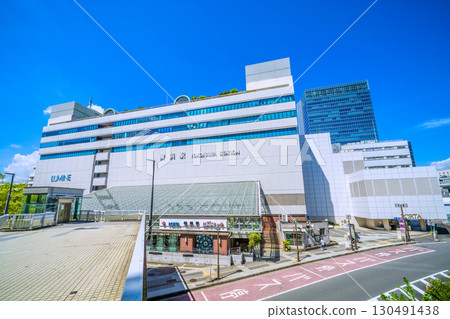 Yokohama cityscape in Japan, including the east exit of Yokohama Station (center) and JR Yokohama Tower (September 6th) 130491438