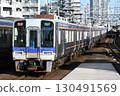 Nankai Electric Railway 2000 series train heading towards Namba on the Nankai Main Line 130491569