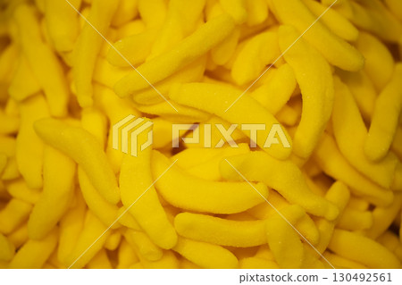 Sweets background. Bright gummy candies close-up. Close-up of colorful jujube background pattern Sweets background. Bright gummy candies close-up. Close-up of colorful jujube background pattern 130492561