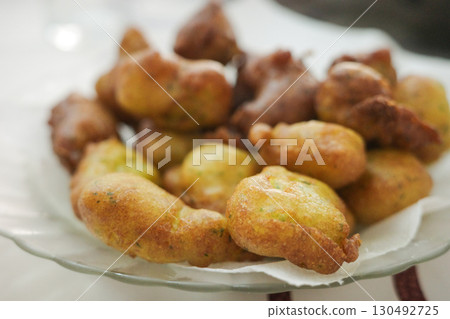 Homemade cod fritters,Spanish bunuelos de bacalao,served on a plate 130492725