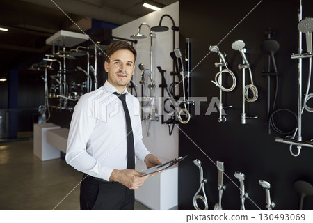 Portrait Of Working Salesman In Plumbing Shop Looking At Camera 130493069