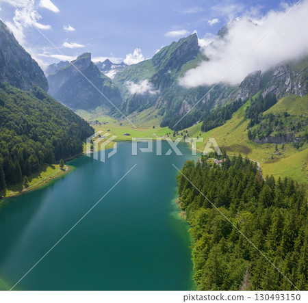 Aerial of beautiful mountain lake Seealpsee in Alps of Switzerland Sunny summer day 130493150