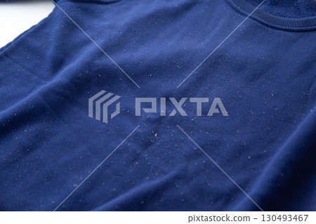 A used sweatshirt covered in pilling 130493467