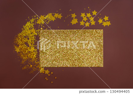 Shining glitter golden paper for creative projects and childrens creativity. Glittering sparkle backdrop. Golden glitter stars Shining glitter golden paper for creative projects and childrens creativity. Glittering sparkle backdrop. Golden glitter stars 130494405