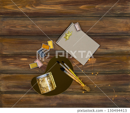 Gold party decoration. Warm holiday golden glow background. Decor means and tools of gold color. Gold party decoration. Warm holiday golden glow background. Decor means and tools of gold color. 130494413
