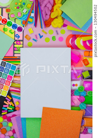 Table of an artist and empty paper. Top view with copy space. Creative tools art accessories. Art mock up Table of an artist and empty paper. Top view with copy space. Creative tools art accessories. Art mock up 130494502