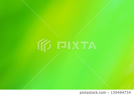 Green blurred colored abstract background. Green trendy out of focus effect. 130494734
