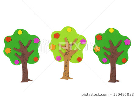 Handcrafted fabulous toy trees made from soft material. Tree on a white background. Garden and fertility concept. Handcrafted fabulous toy trees made from soft material. Tree on a white background. Garden and fertility concept. 130495058