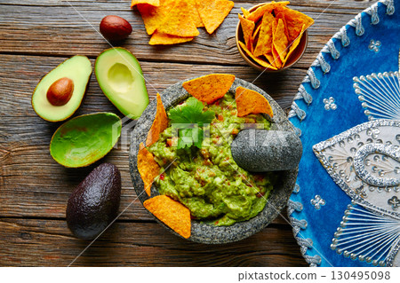 Guacamole with nachos in Mexican molcajete 130495098