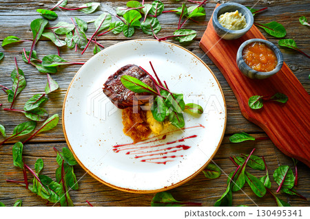 Veal sirloin, mashed potatoes chards and shallots Veal sirloin, mashed potatoes chards and shallots 130495341