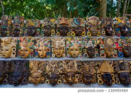 Chichen itza Mayan handcrafts wood masks 130495484