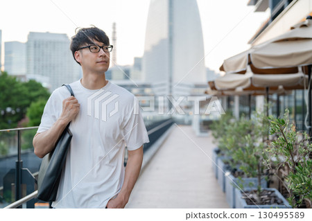 Men walking through the streets 130495589