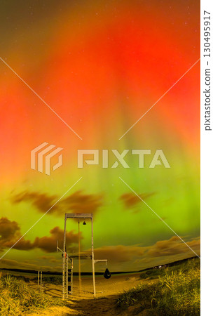 The Aurora Borealis, the northern lights, showing up at the beach gym in Portnoo, County Donegal, Ireland. 130495917