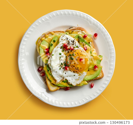 breakfast toast with avocado and egg 130496173