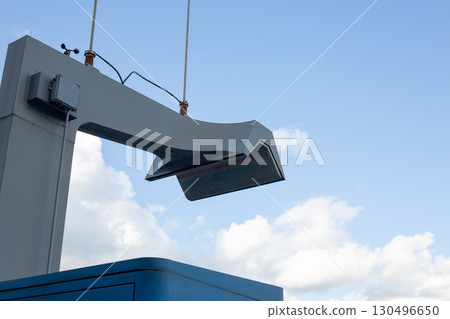 Electric bus charging station with an overhead pantograph system. The bus connects automatically to the charger, enabling rapid DC charging up to 600 kW, ensuring efficient urban transportation 130496650