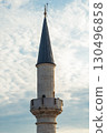 Istanbul, Turkey. Elegant minaret of an Ottoman-style mosque. Islamic architecture, cultural heritage, and the spiritual identity of Turkey. 130496858