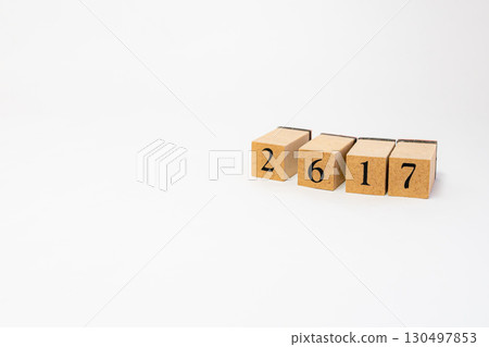 Product photography of numbers lined up on wooden blocks 2617 130497853