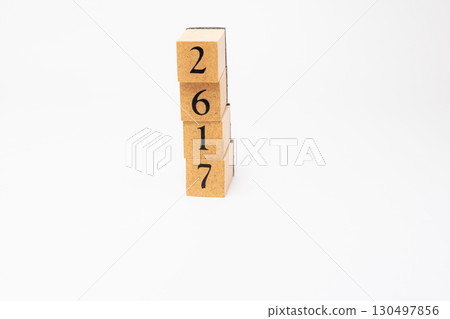 Product photography of numbers lined up on wooden blocks 2617 130497856
