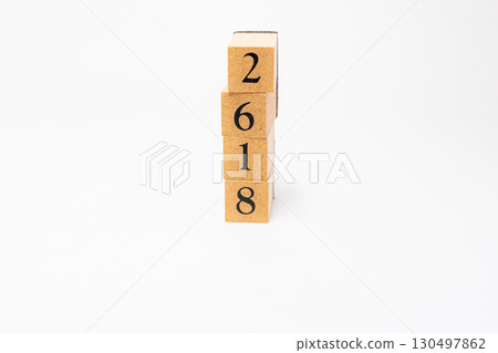 Product photography of numbers lined up on wooden blocks 2618 130497862