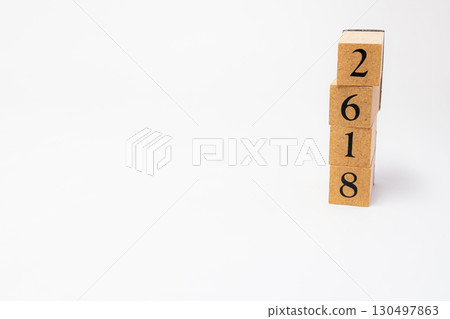 Product photography of numbers lined up on wooden blocks 2618 Product photography of numbers lined up on wooden blocks 2618 130497863
