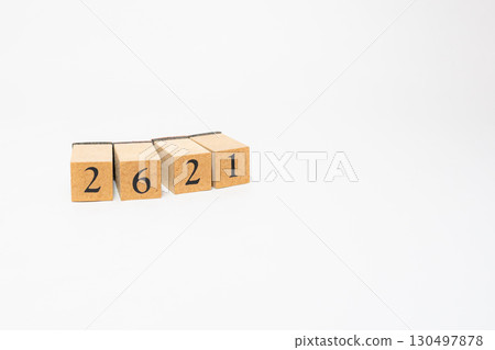 Product photography of numbers lined up on wooden blocks 2621 130497878