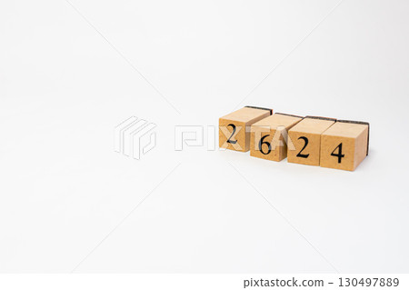 Product photography of numbers lined up on wooden blocks 2624 130497889
