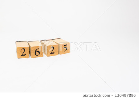 Product photography of numbers lined up on wooden blocks 2625 130497896