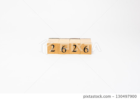 Product photography of numbers lined up on wooden blocks 2626 Product photography of numbers lined up on wooden blocks 2626 130497900