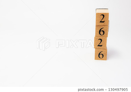 Product photography of numbers lined up on wooden blocks 2626 130497905