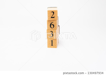 Product photography of numbers lined up on wooden blocks 2631 130497934