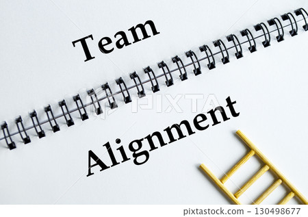 Team Alignment, Notebook and ladder illustrating teamwork unity and coordinated collaboration. Team Alignment, Notebook and ladder illustrating teamwork unity and coordinated collaboration. 130498677