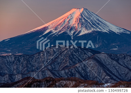 Mount Fuji at sunrise as seen from Shiratani-no-maru in the Daibosatsu Range 130499726