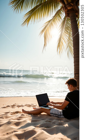 Freelancer guy works remotely on his laptop while sitting on the sand on a tropical beach 130502305