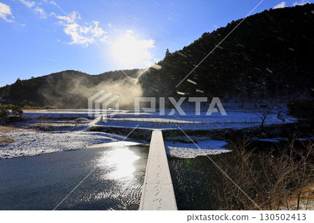 Submerged bridge in winter 130502413