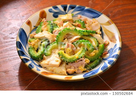 Okinawan Goya Chanpuru, a local dish made with bitter melon, pork, firm tofu, eggs, and bonito flakes. 130502684