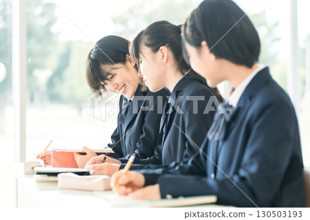 Elementary school students, junior high school students, high school students, and high school girls (friends) taking classes together in a school classroom Elementary school students, junior high school students, high school students, and high school girls (friends) taking classes together in a school classroom 130503193