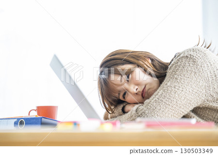 Young woman tired of work 130503349