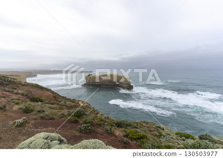 The Bakers Oven so called for the shape of the natural arch in the cliff face. A sea stack on the coast of the Great ocean Road, Australia. 130503977