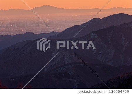 View of the Kanto Plain cityscape and Mount Tsukuba at sunrise from Shiratani-no-maru in the Daibosatsu Range View of the Kanto Plain cityscape and Mount Tsukuba at sunrise from Shiratani-no-maru in the Daibosatsu Range 130504769