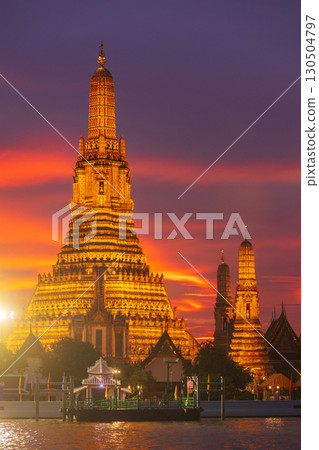 Twilight view of Wat Arun Ratchawararam Ratchawaramahawihan at sunset in bangkok Thailand. Landmark of Along the Chao Phraya River Thailand 130504797