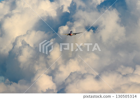 Airplane - Clouds with various expressions - Taking off into summer clouds - 777 130505314