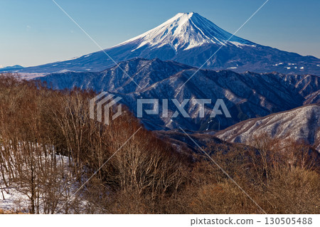 Mount Fuji seen from Okura Takamaru in the Daibosatsu Range in winter Mount Fuji seen from Okura Takamaru in the Daibosatsu Range in winter 130505488